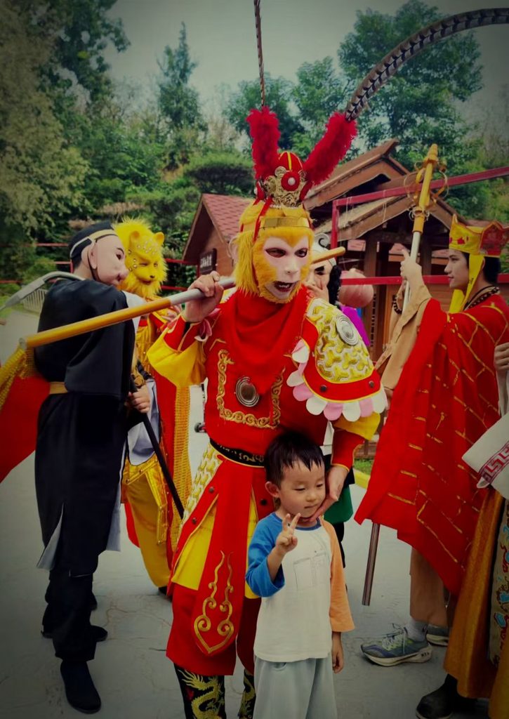 Monkey King performer with the golden staff.