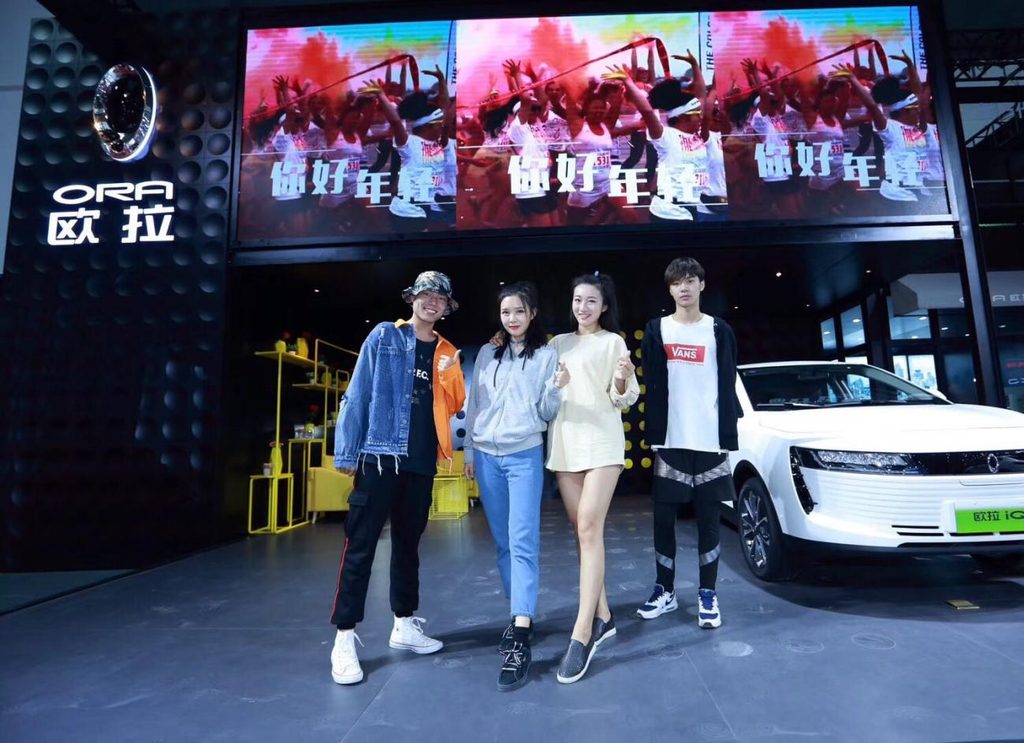 ING Entertainment performance team on the ORA stand at a Chinese auto show