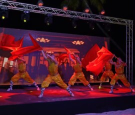 Shaolin battle flag performance on an outdoor stage at Velaa Private Island, Maldives